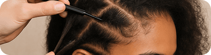 Parting hair into sections with a comb